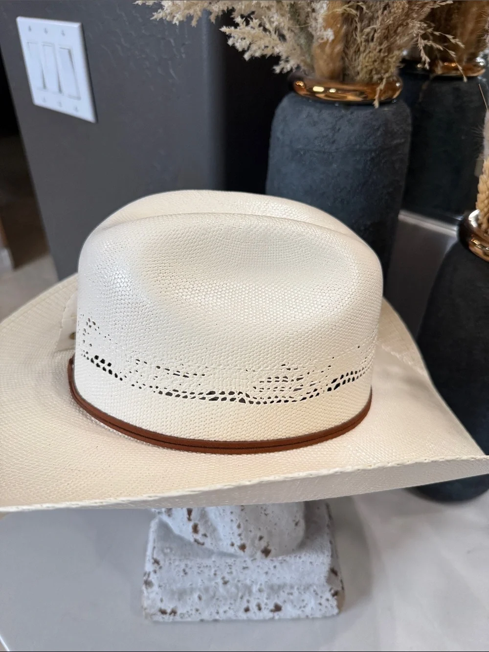 White Straw Cowboy Hat with Patriotic Red White and Blue Feathers.